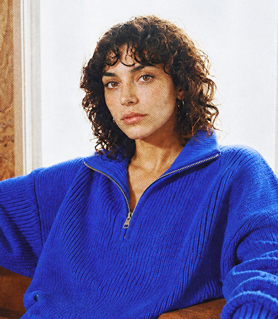 Portrait of a woman in a blue sweater